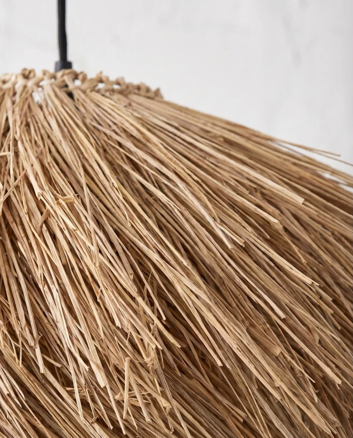 Savana – Suspension en rotin à franges naturelles